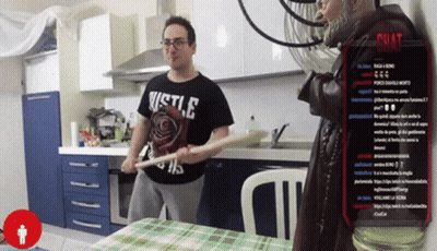 Man In Hustle Shirt Holding Bat GIF