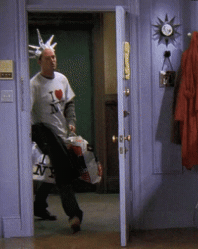 Man In I Love NY Shirt In Doorway GIF