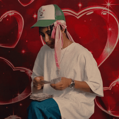 Man In I Love You Hat Holding Stack Of Money GIF
