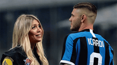 Man In Icardi Jersey Next To Woman In Warriors Shirt GIF