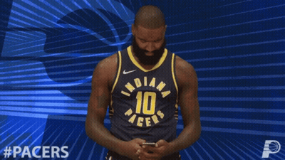 Man In Indiana Pacers Jersey Looking At Phone GIF