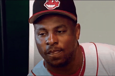 Man In Indians Hat And White Shirt GIF
