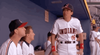 Man In Indians Uniform Talking In Dugout GIF