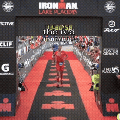 Man In Iron Man Suit Standing In City GIF