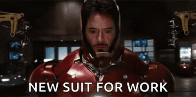 Man In Iron Man Suit Wearing Helmet GIF