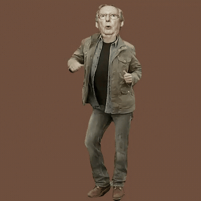 Man In Jacket And Jeans Dancing With Mouth Open GIF