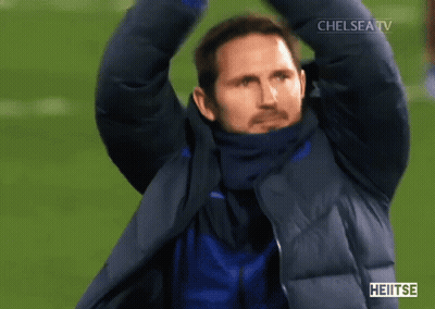 Man In Jacket In Front Of Crowd With Chelsea GIF