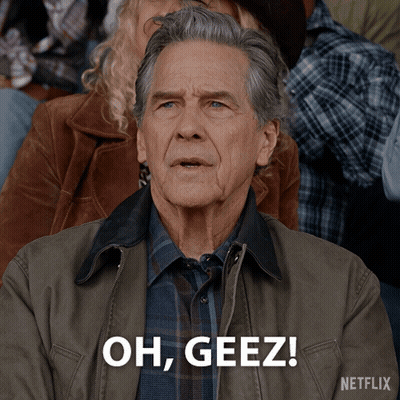 Man In Jacket Saying Oh Geez In Crowd GIF