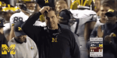 Man In Jacket With Letter M GIF