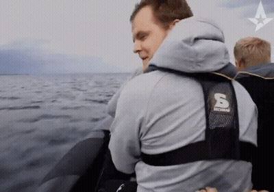 Man In Jacket With Letter S On Back GIF