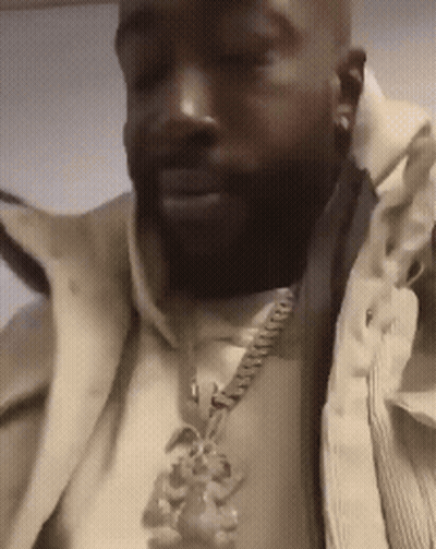Man In Jacket With P Necklace GIF