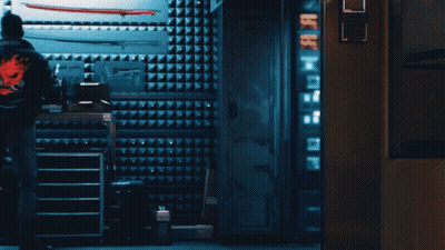 Man In Jacket With Red Skull On Back GIF