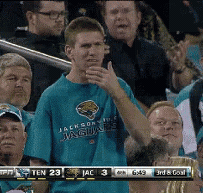 Man In Jacksonville Jaguars Shirt In Crowd GIF