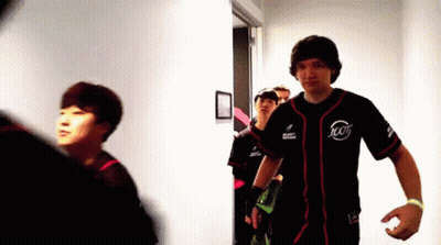 Man In Jersey Number 100 Walking Down Hallway GIF