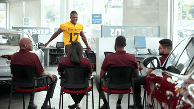 Man In Jersey Number 17 Standing Before Crowd GIF