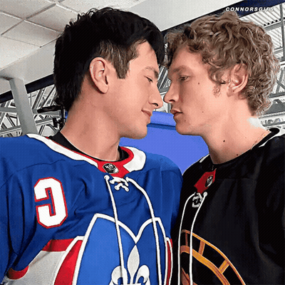 Man In Jersey Number 3 Kissing Another Man GIF