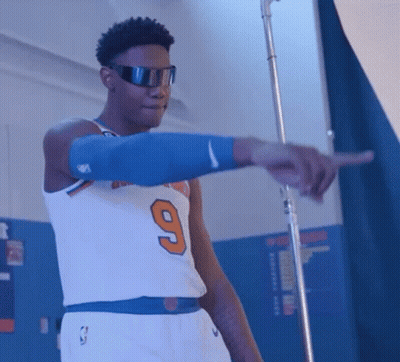 Man In Jersey Number 9 And Sunglasses GIF