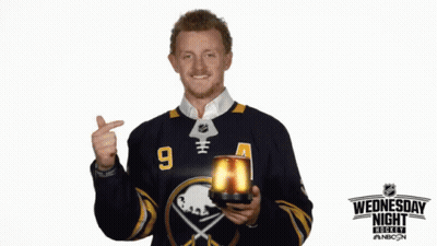 Man In Jersey Number 9 Holding Cup GIF