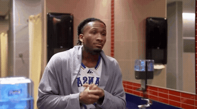 Man In Jersey Saying A2wa In Bathroom GIF