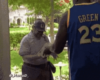 Man In Jersey Saying Green On Back GIF