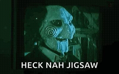 Man In Jigsaw Mask In Front Of TV Saying Heck Nah Jigsaw GIF