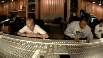 Man In Joker Sweatshirt At Mixing Board GIF
