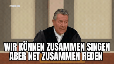 Man In Judge Robe Singing At Bench GIF