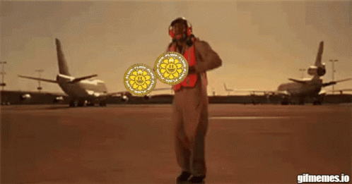 Man In Jumpsuit In Front Of Flying Lotus Plane GIF