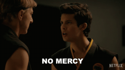 Man In Karate Uniform Says No Mercy GIF
