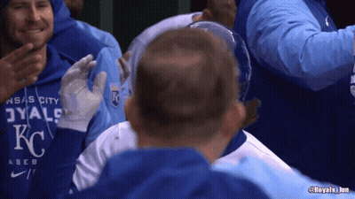 Man In KC Sweatshirt Hugged By Another Man GIF
