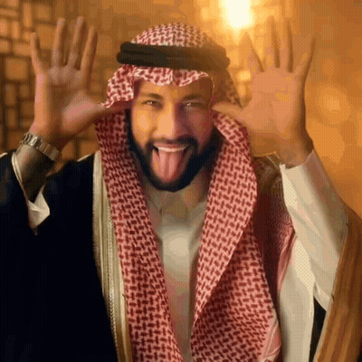 Man In Keffiyeh With Tongue Out GIF