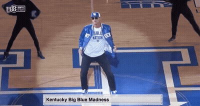 Man In Kentucky Big Blue Madness Shirt Dancing On Basketball Court GIF