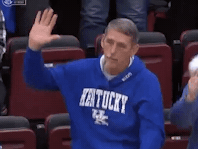 Man In Kentucky Sweatshirt Waving GIF