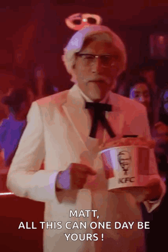 Man In KFC Costume Holding Bucket Of Fried Chicken GIF