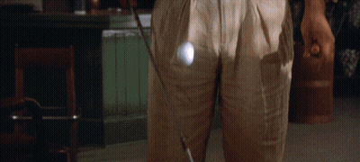 Man In Khaki Pants Holding Golf Club GIF