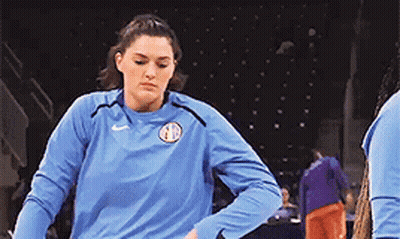 Man In Kid's Pro Shirt Next To Boy GIF