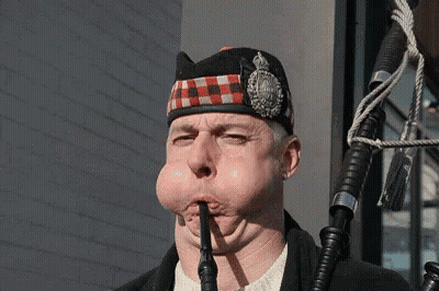 Man In Kilt Blowing Bagpipe GIF