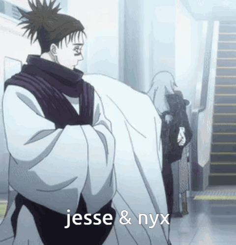 Man In Kimono Next To Woman In Wheelchair GIF