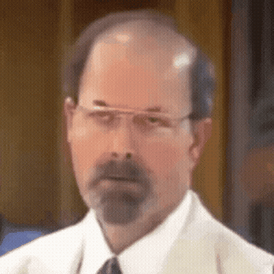 Man In Kimono Sitting At Table With Food GIF