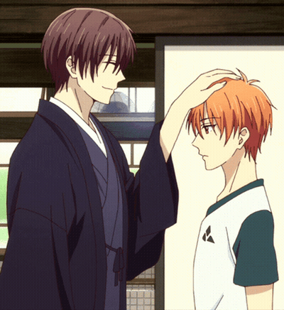 Man In Kimono Touches Head Of Man In White Shirt GIF