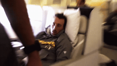 Man In Kings Hoodie Lying In Hospital Bed GIF