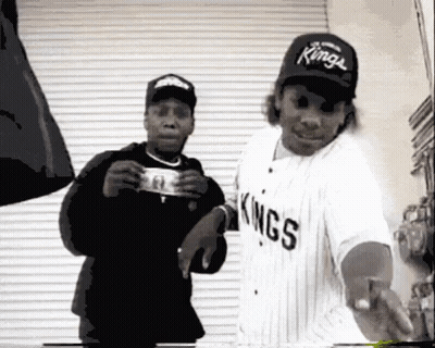 Man In Kings Jersey Holding Dollar Bill GIF