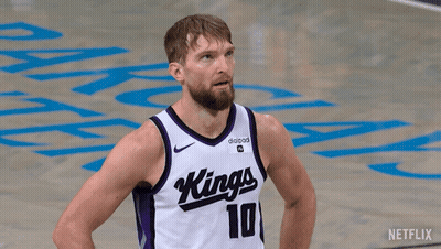 Man In Kings Jersey Stands On Court GIF