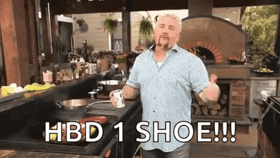 Man In Kitchen Holding Mug Saying HBD 1 Shoe GIF