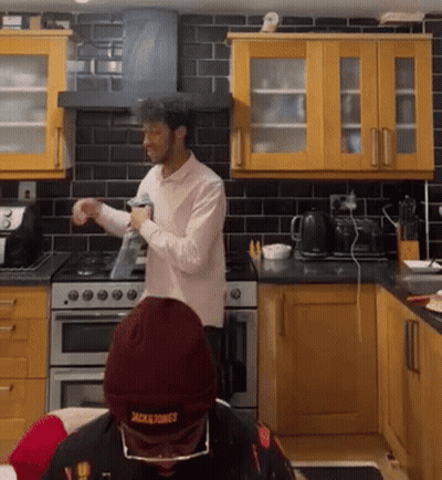 Man In Kitchen Wearing Jacksons Beanie GIF