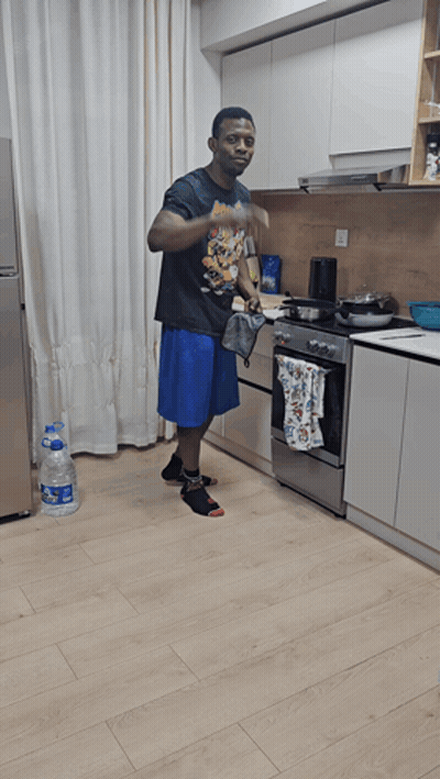 Man In Kitchen Wearing Nintendo T-Shirt GIF