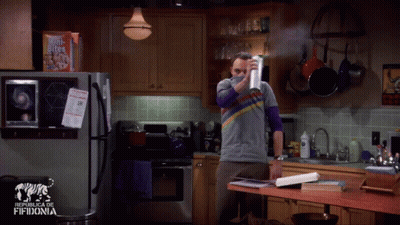 Man In Kitchen With Box Of Oats GIF