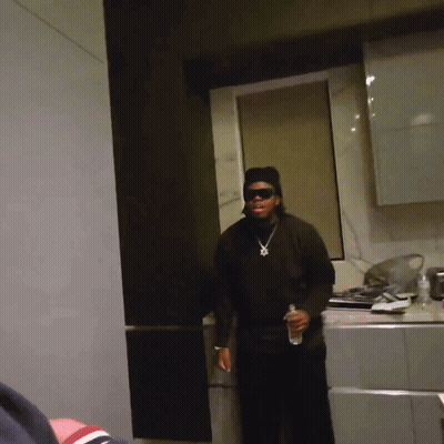 Man In Kitchen With Sunglasses And Hat GIF
