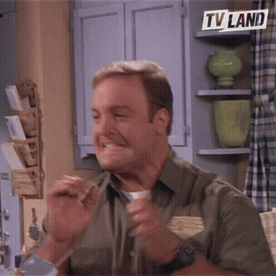 Man In Kitchen With TV Land Sign GIF