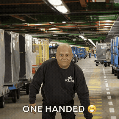 Man In KLM Sweatshirt In Warehouse GIF